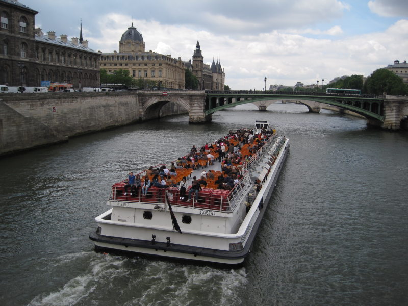 [Huge tour boats on the Seine.]