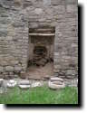 [ A hearth or storage area. ... ]