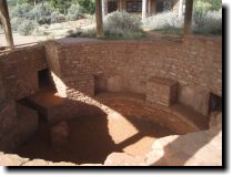 [ The restored kiva at the  ... ]